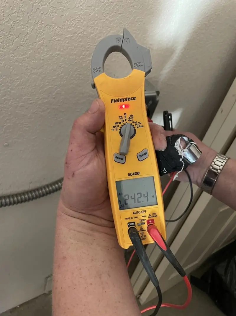 Voltage testing with clamp meter during Generator Installation in Rancho Cordova